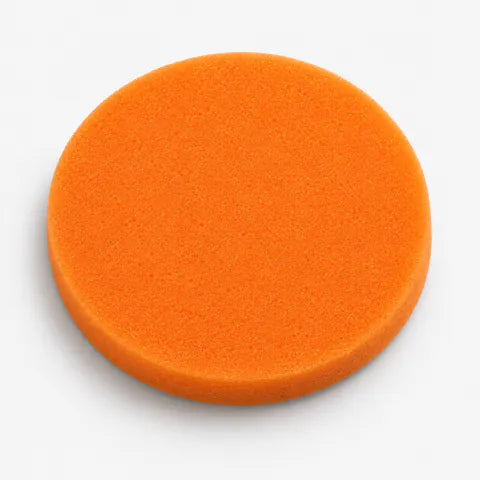 Orange flat foam pad included with Gloss Boss Max, showing the smooth working surface.