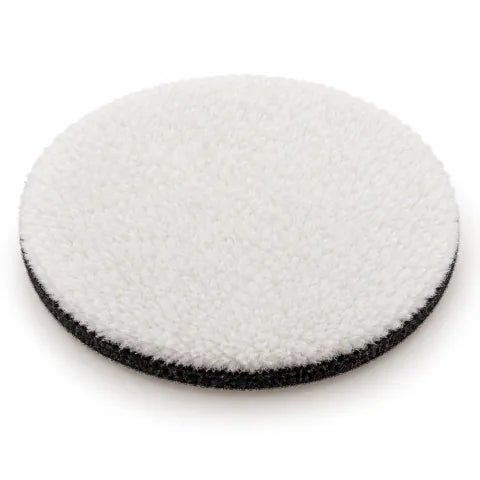 White short-pile wool disc with black backing included with Gloss Boss Max.