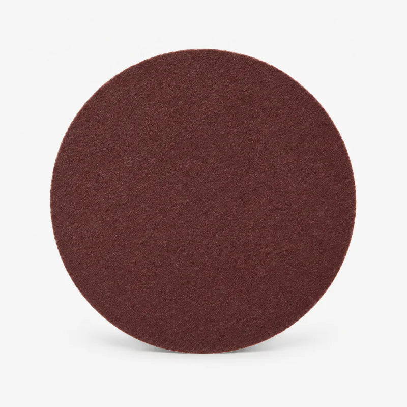 Thin brown abrasive sanding disc supplied with the original Gloss Boss kit.
