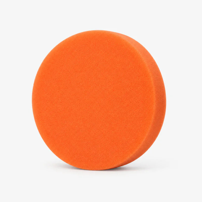 Orange foam polishing pad with a smooth flat face from the original Gloss Boss kit.